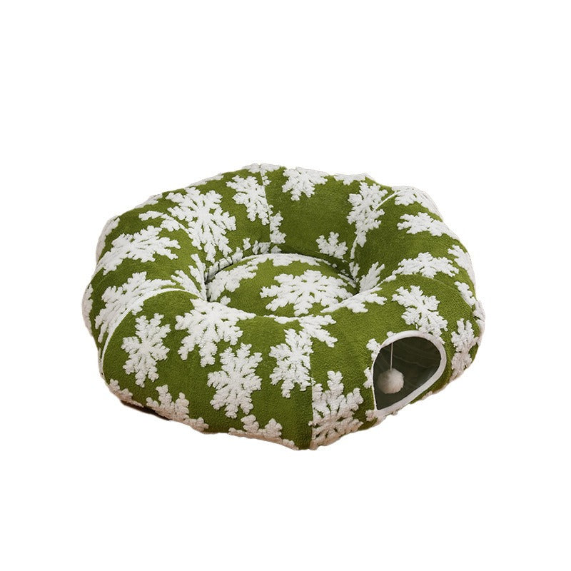 Green snowflake cat tunnel bed with white pom-pom toy