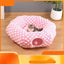 Pink polka dot cat tunnel bed with kitten resting in the center