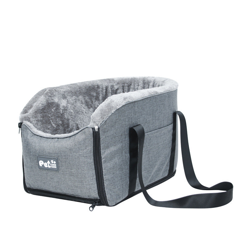 Gray pet carrier with a strap on a white background